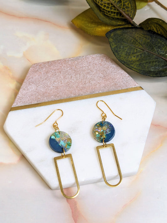 "Beatrice" Teal Glitter Circle Dangle Earrings with Long D Brass Charm