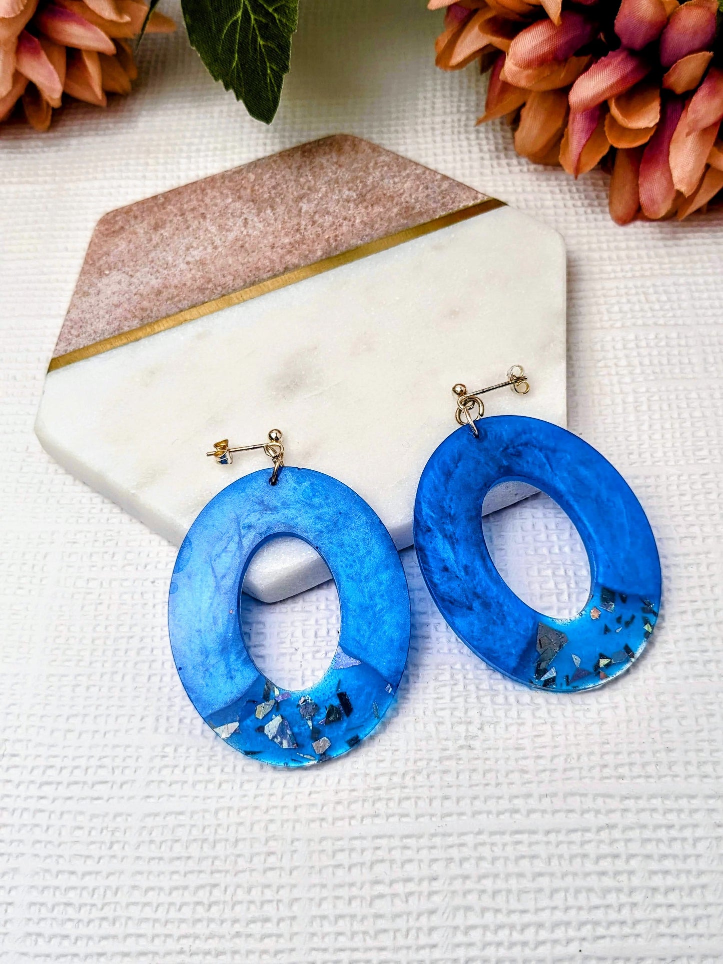 Metallic blue oval resin statement dangle earrings from sustainable No Waste collection