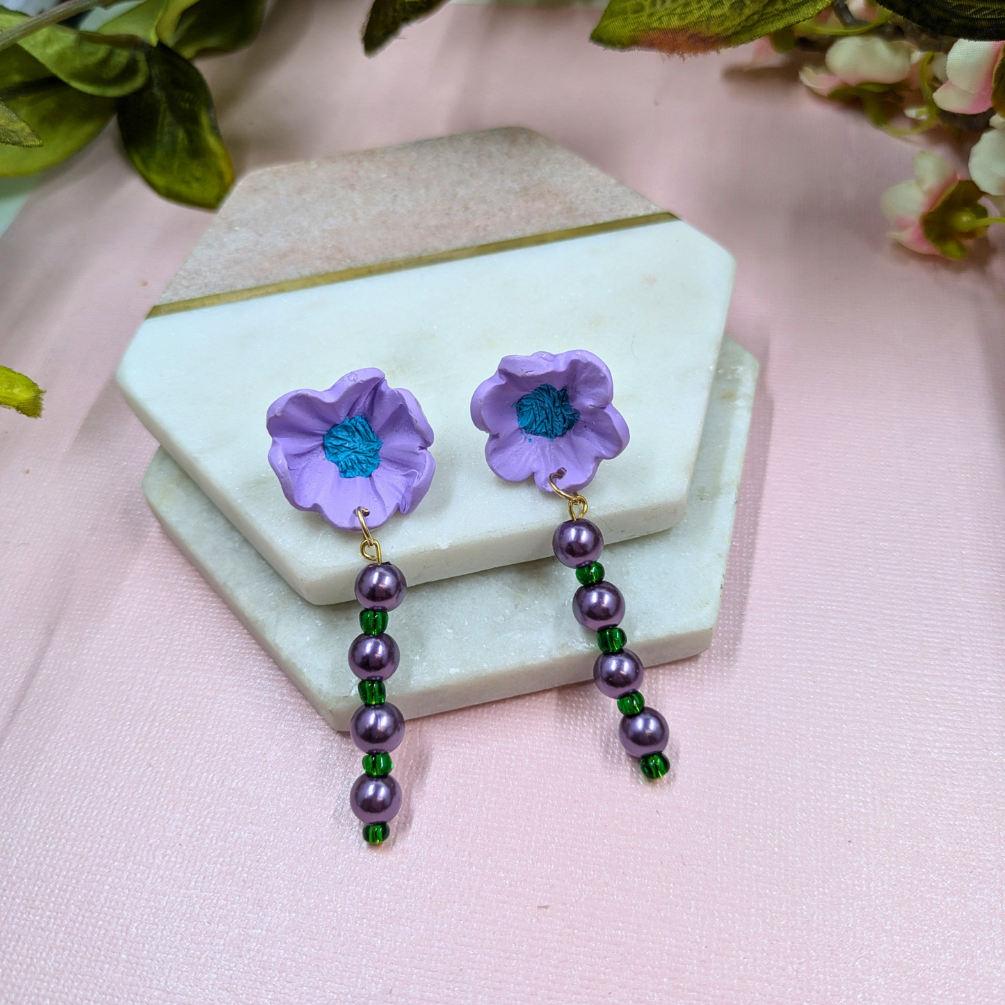 Close-up of recycled purple pearl beads on Sylvie elegant earrings