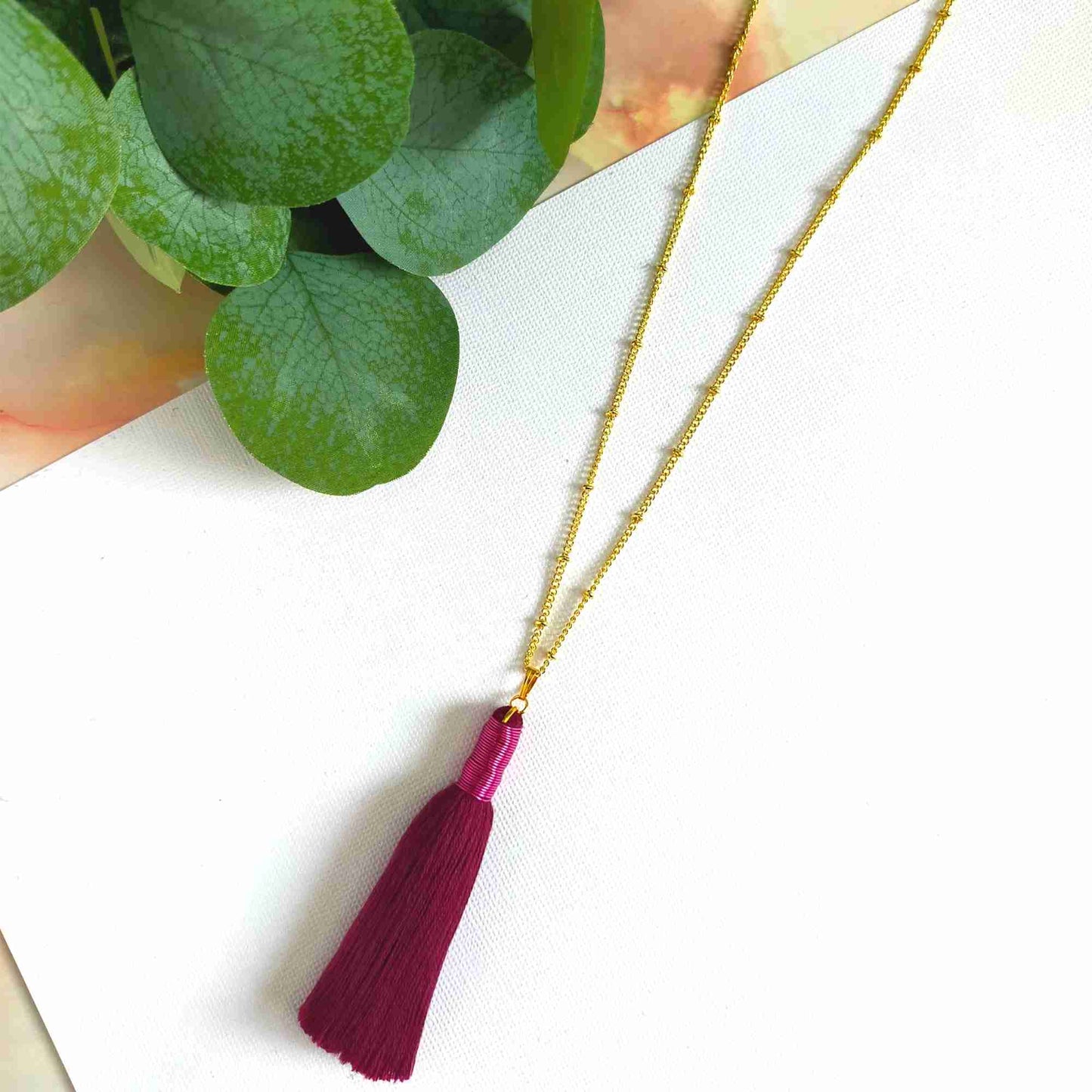 "Noa" Wine Tassel Necklace with Pink Metal wrap