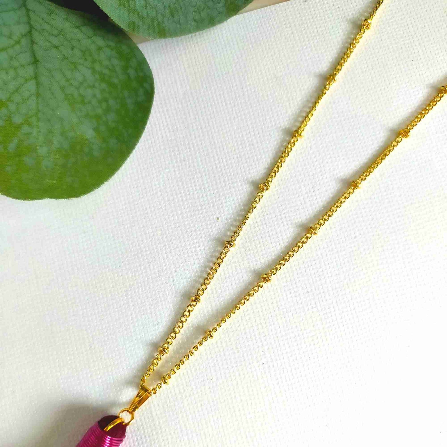 "Noa" Wine Tassel Necklace with Pink Metal wrap
