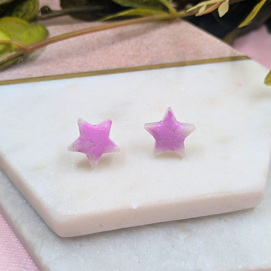 Handmade 'Selene' pink and white metallic star stud resin earrings by Created By Lau — celestial jewellery made in Shipley, West Yorkshire
