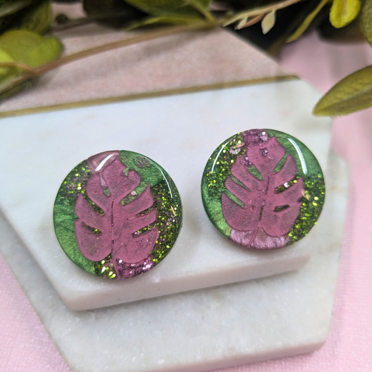 Handmade 'Tania' pink monstera green glitter resin clip-on earrings by Created By Lau — botanical jewellery made in Shipley, West Yorkshire