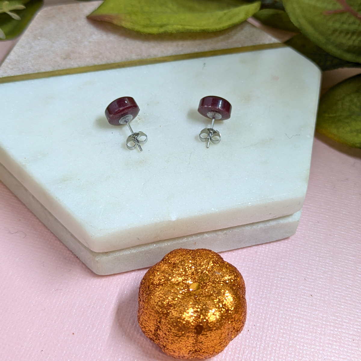 Back view of Bridget Blood Red resin stud earrings showing secure stainless steel scroll fittings — handmade resin jewellery by Created By Lau, Yorkshire