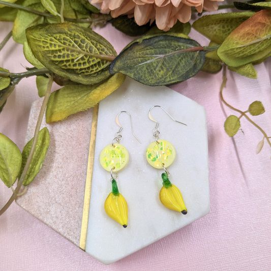 Chiquita Yellow Glitter Resin Circle & Glass Banana Charm Earrings | Tutti Fruity Collection by Created By Lau