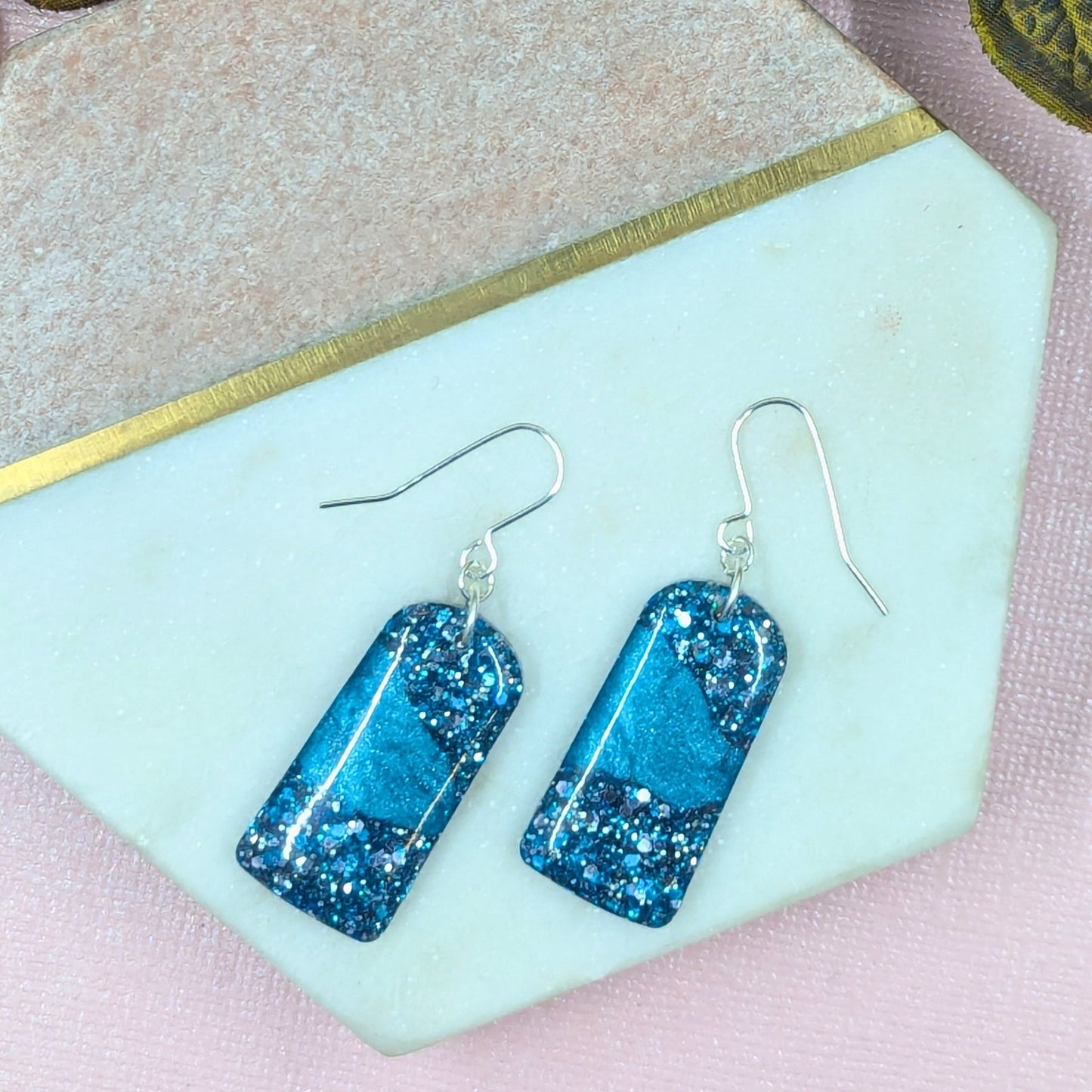 "Sarai" Blue Metallic Glitter Resin Arch Earrings