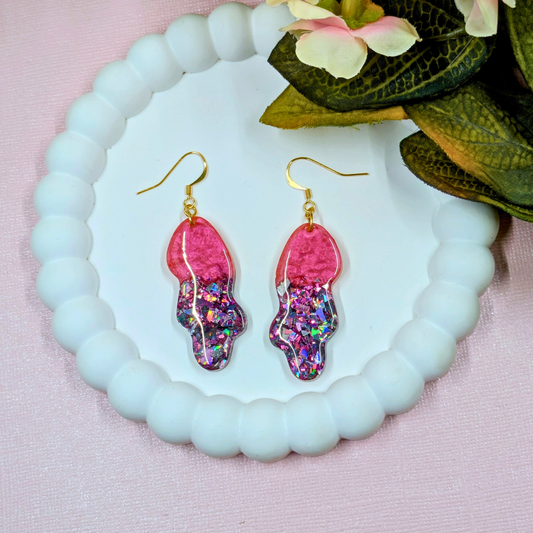 Billie red and blue glitter wavy resin dangle earrings with gold plated hooks handmade in Yorkshire