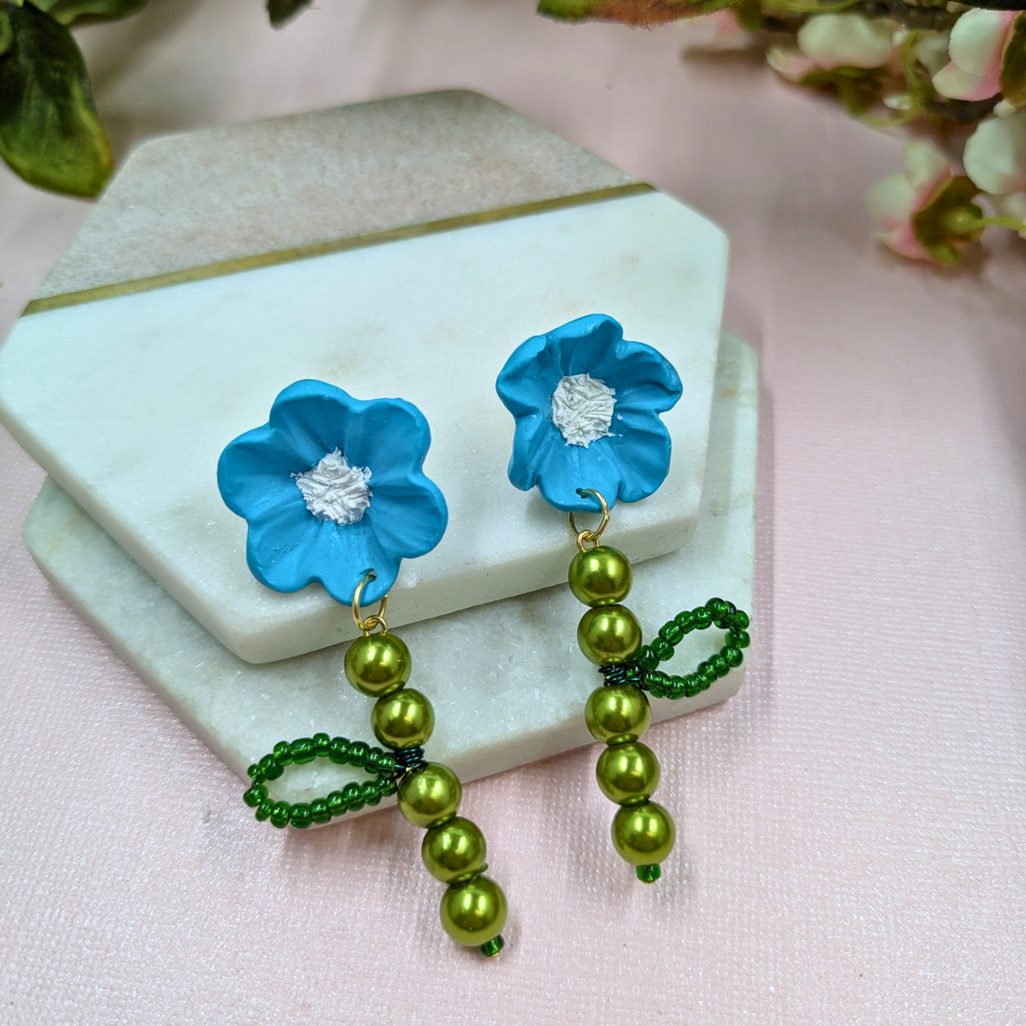 Angled view showing botanical design of Fern handmade earrings