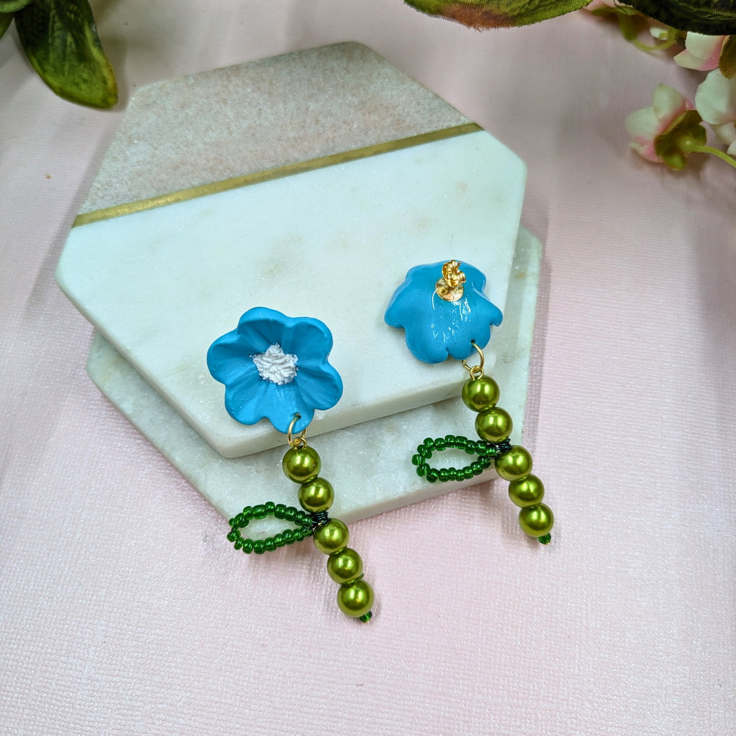 Pair of Fern blue and green nature-inspired earrings Resurrection Collection
