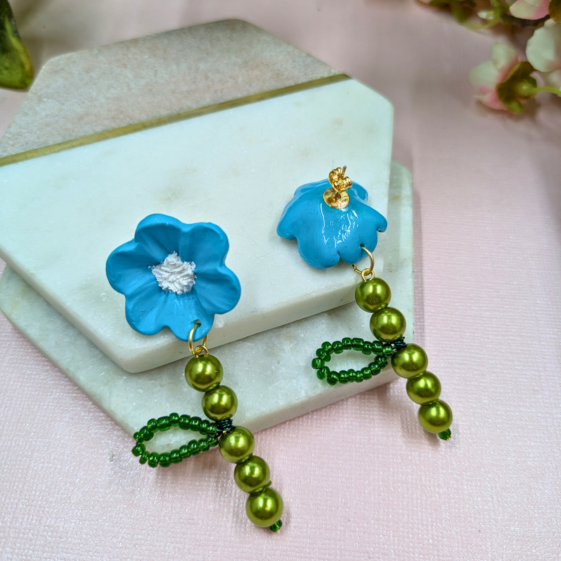 Recycled green pearl detail on Fern blue flower earrings gold plated