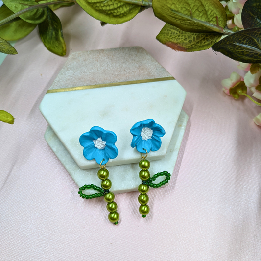 Fern blue polymer clay flower earrings with green pearl leaf stems