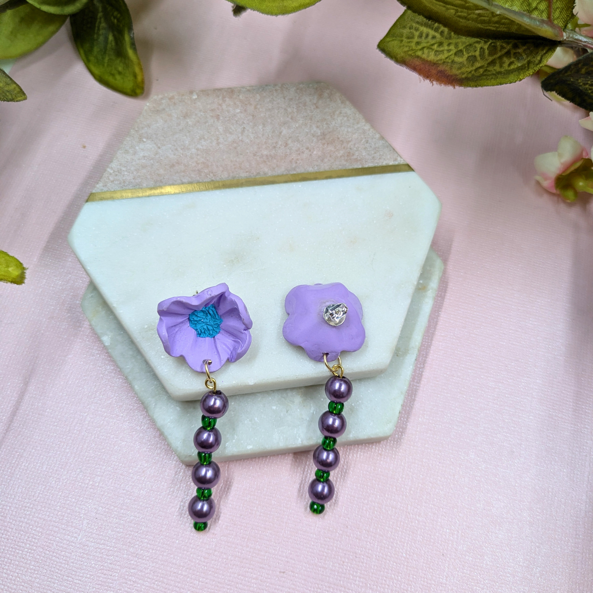 Pair of Sylvie purple and green elegant earrings from Resurrection Collection