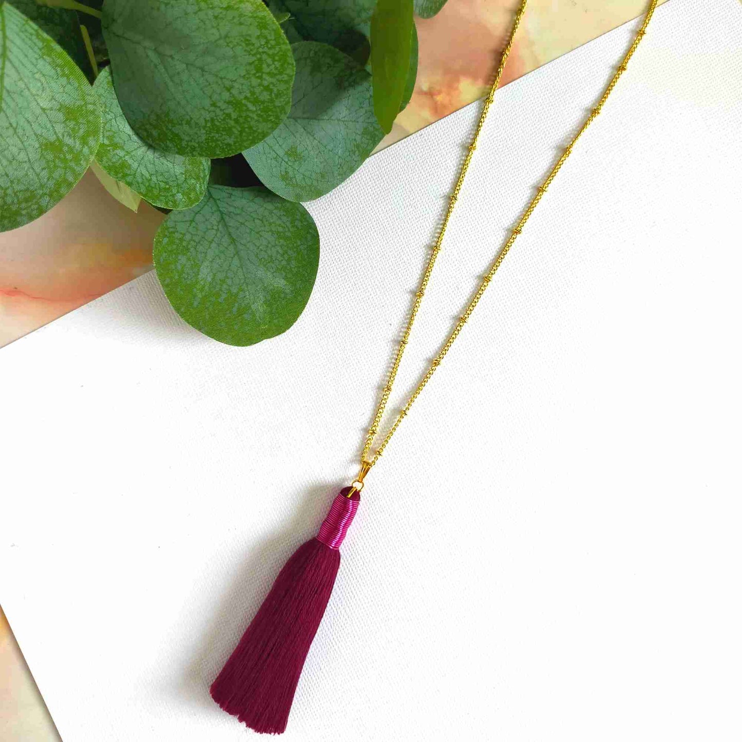 "Noa" Wine Tassel Necklace with Pink Metal wrap